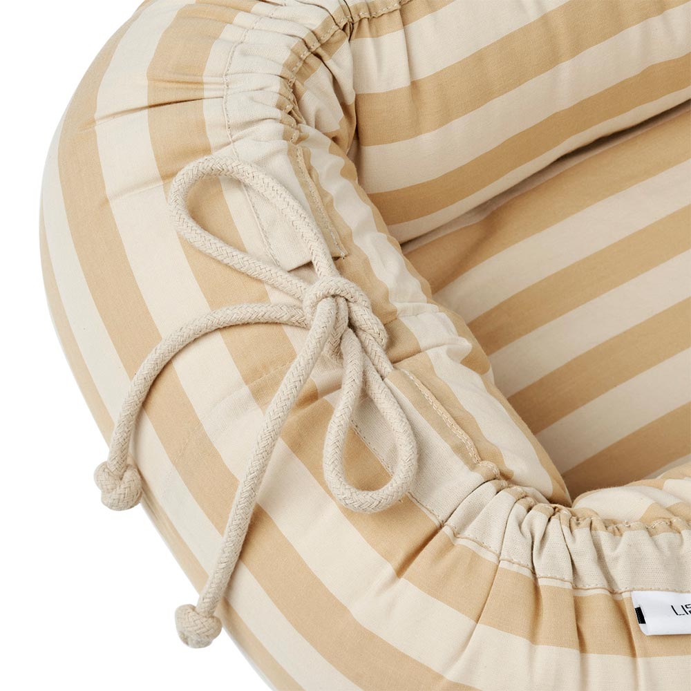 Köp Liewood Gro babynest Safari/sandy Pyret & Snäckan