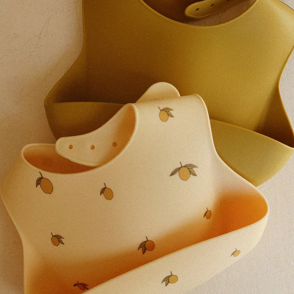 Konges Slöjd Silikonhaklappar 2-pack Lemon/Almond