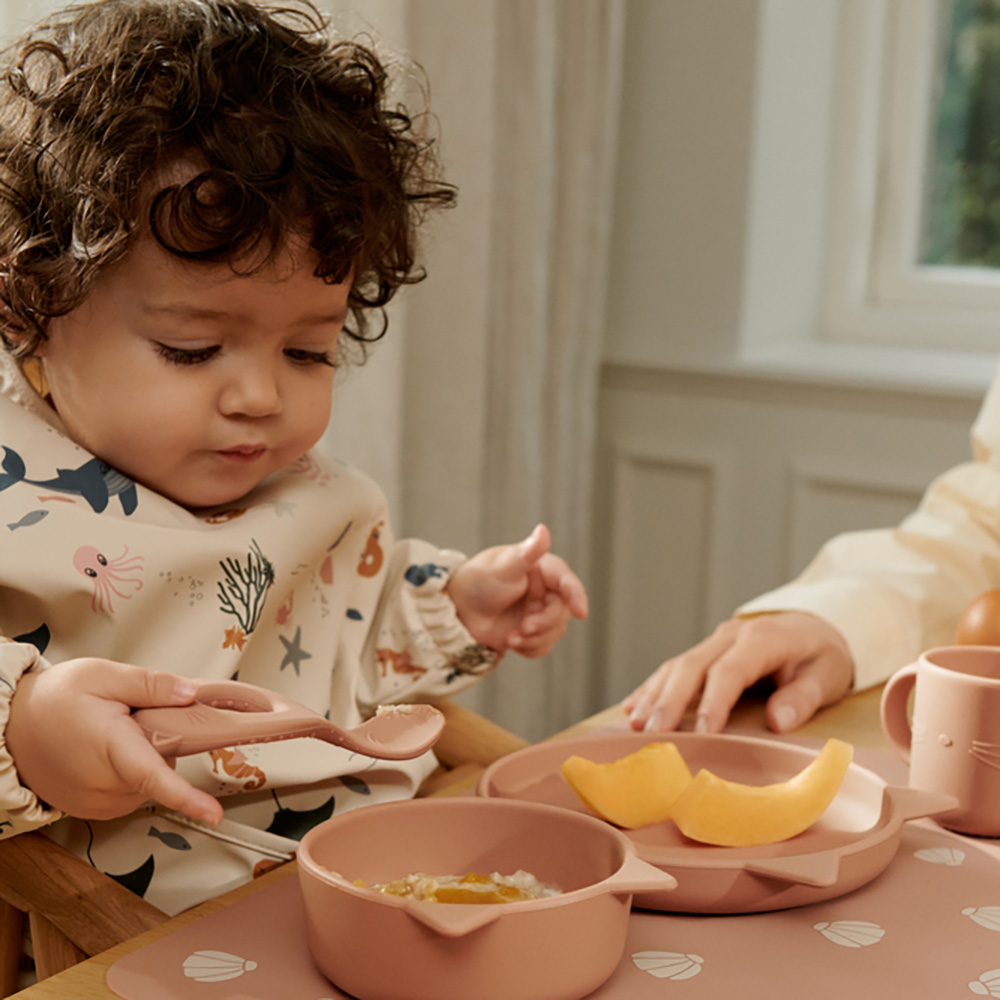 Liewood Merle Printed haklapp med ärm Sea creature / Sandy