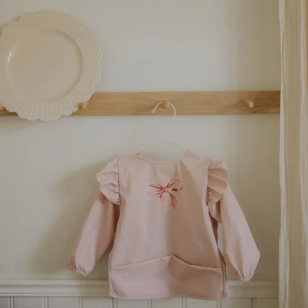 Elodie Longsleeved Baby Bib Rosy Bow One size