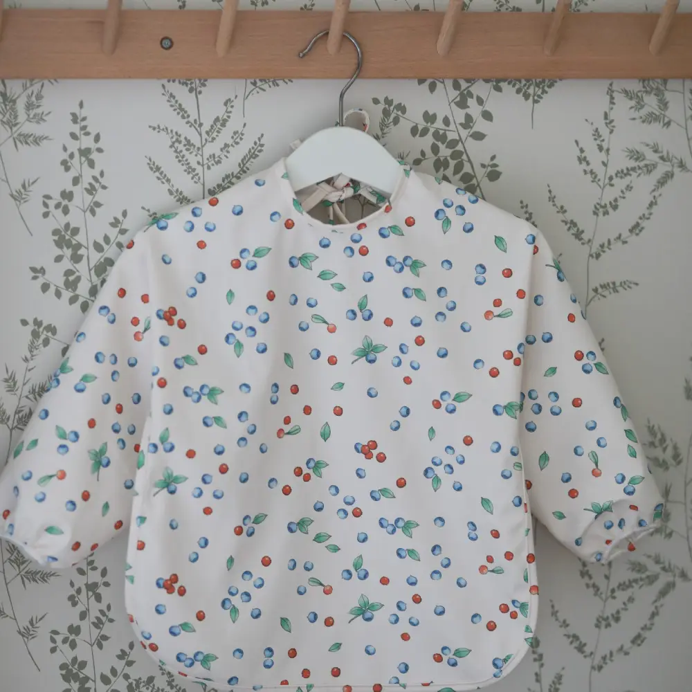 Rätt Start Beskow Putte i Blåbärsskogen Haklapp med ärm