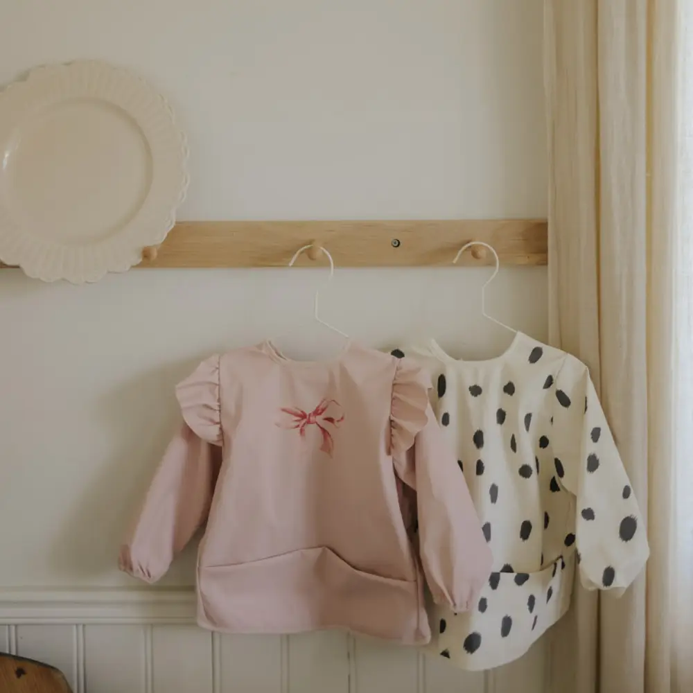 Elodie Longsleeved Baby Bib Rosy Bow One size